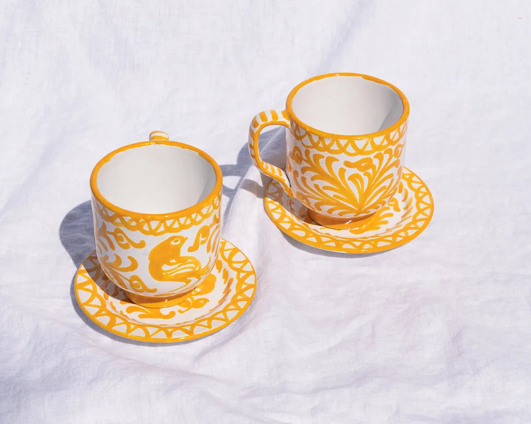 Mug with hand painted designs