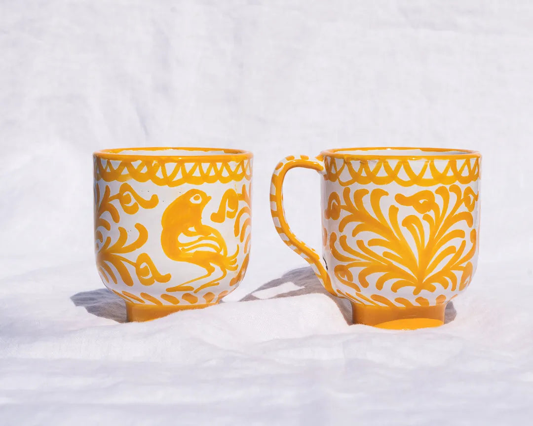 Mug with hand painted designs