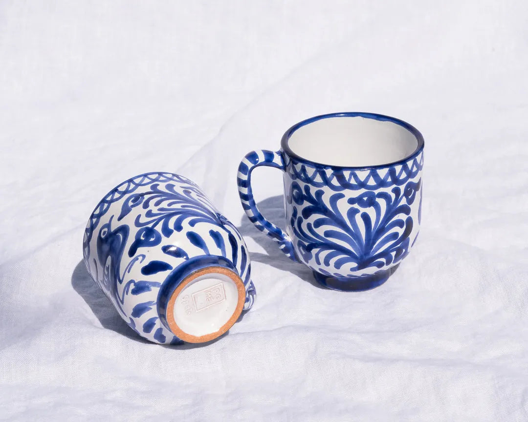 Mug with hand painted designs