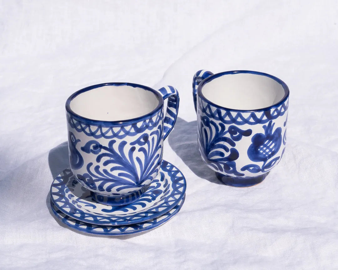 Mug with hand painted designs