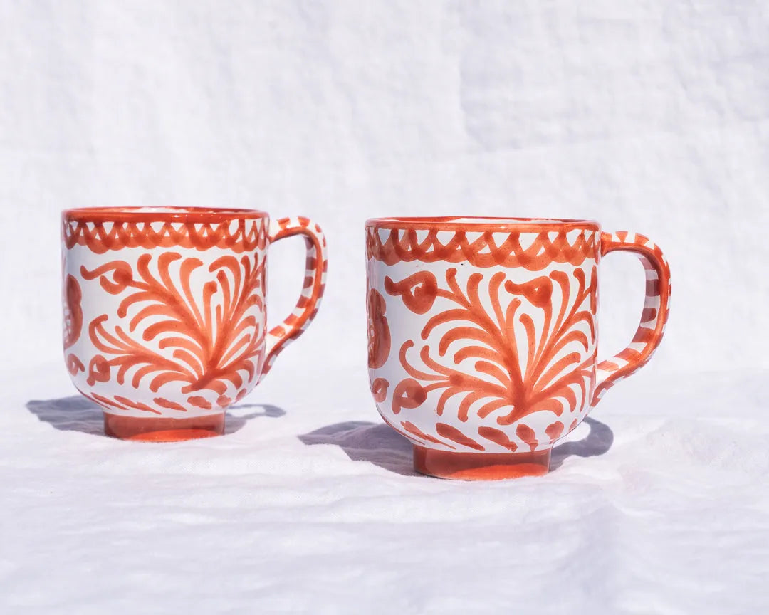 Mug with hand painted designs