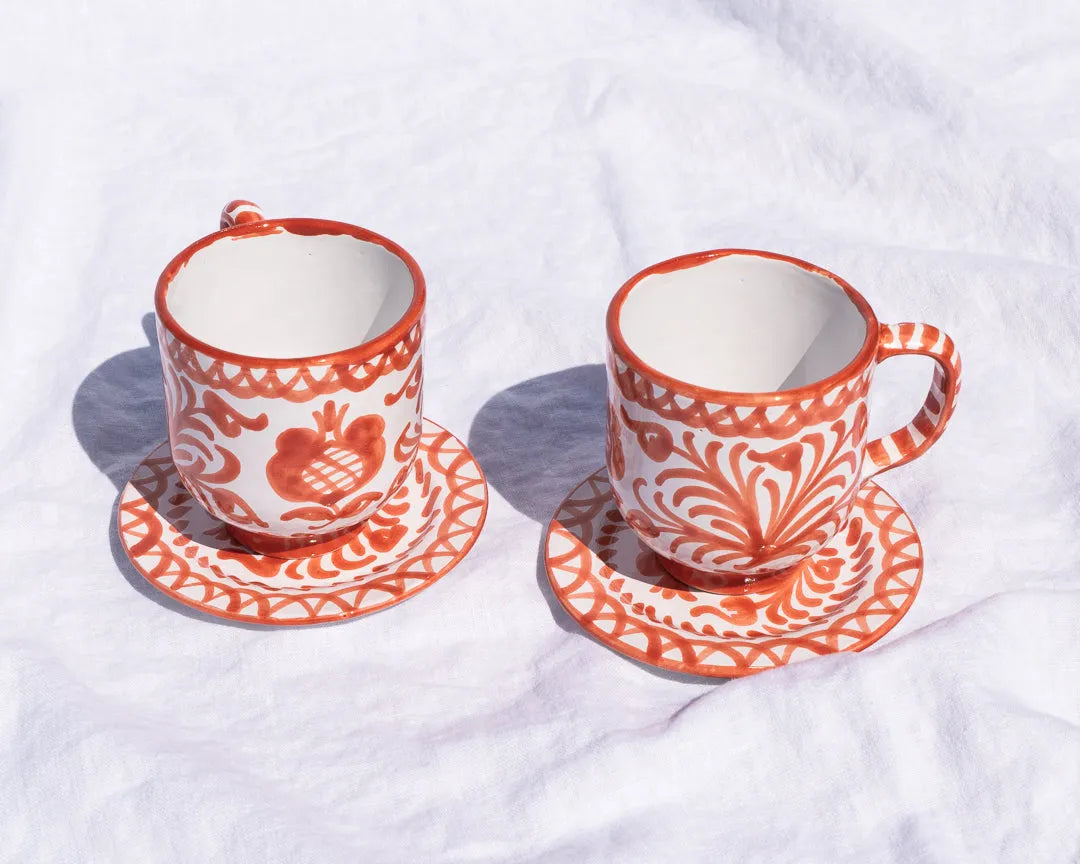 Mug with hand painted designs