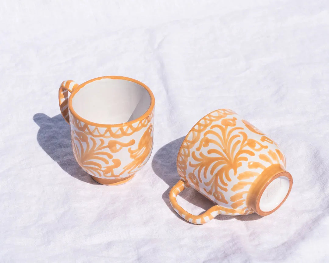 Mug with hand painted designs