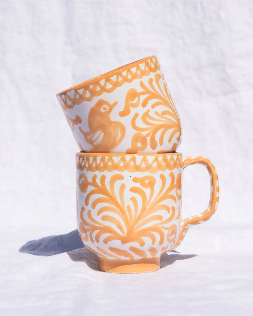 Mug with hand painted designs