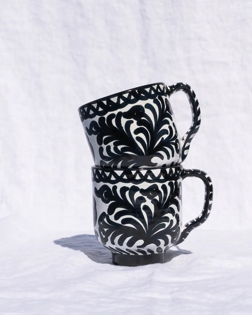 Mug with hand painted designs