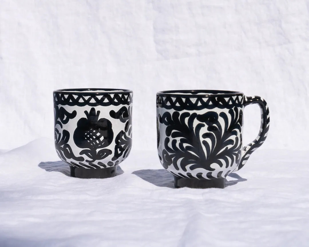 Mug with hand painted designs