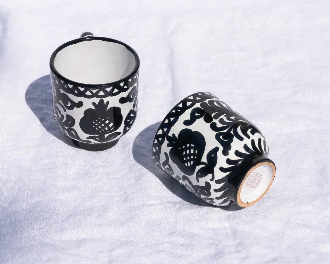 Mug with hand painted designs