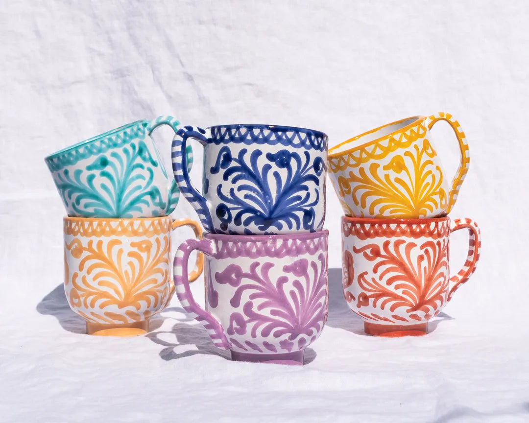 Mug with hand painted designs