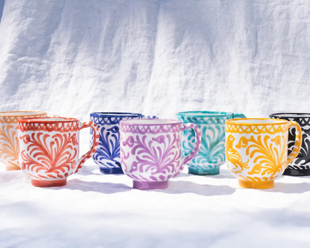 Mug with hand painted designs