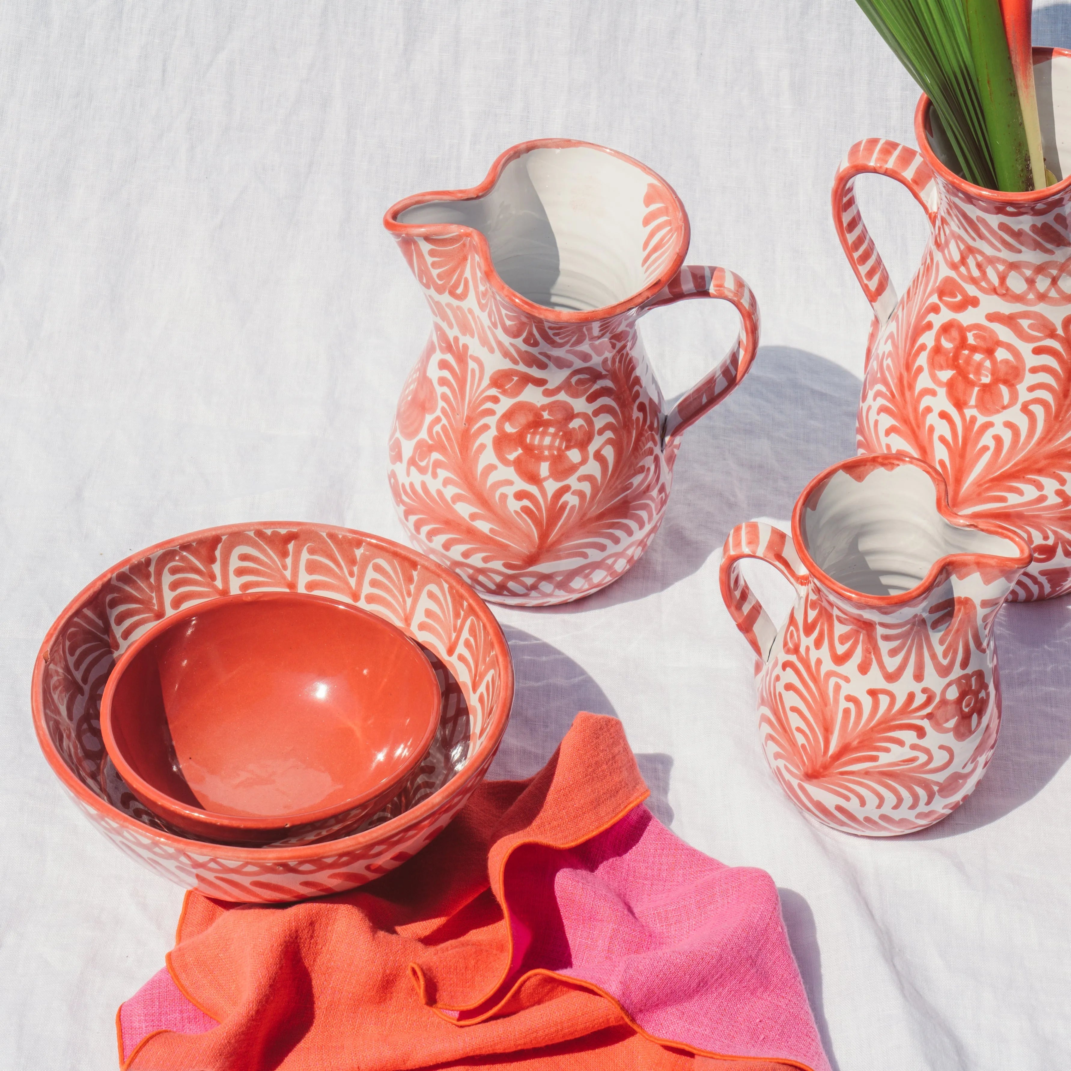 Medium pitcher with hand painted designs