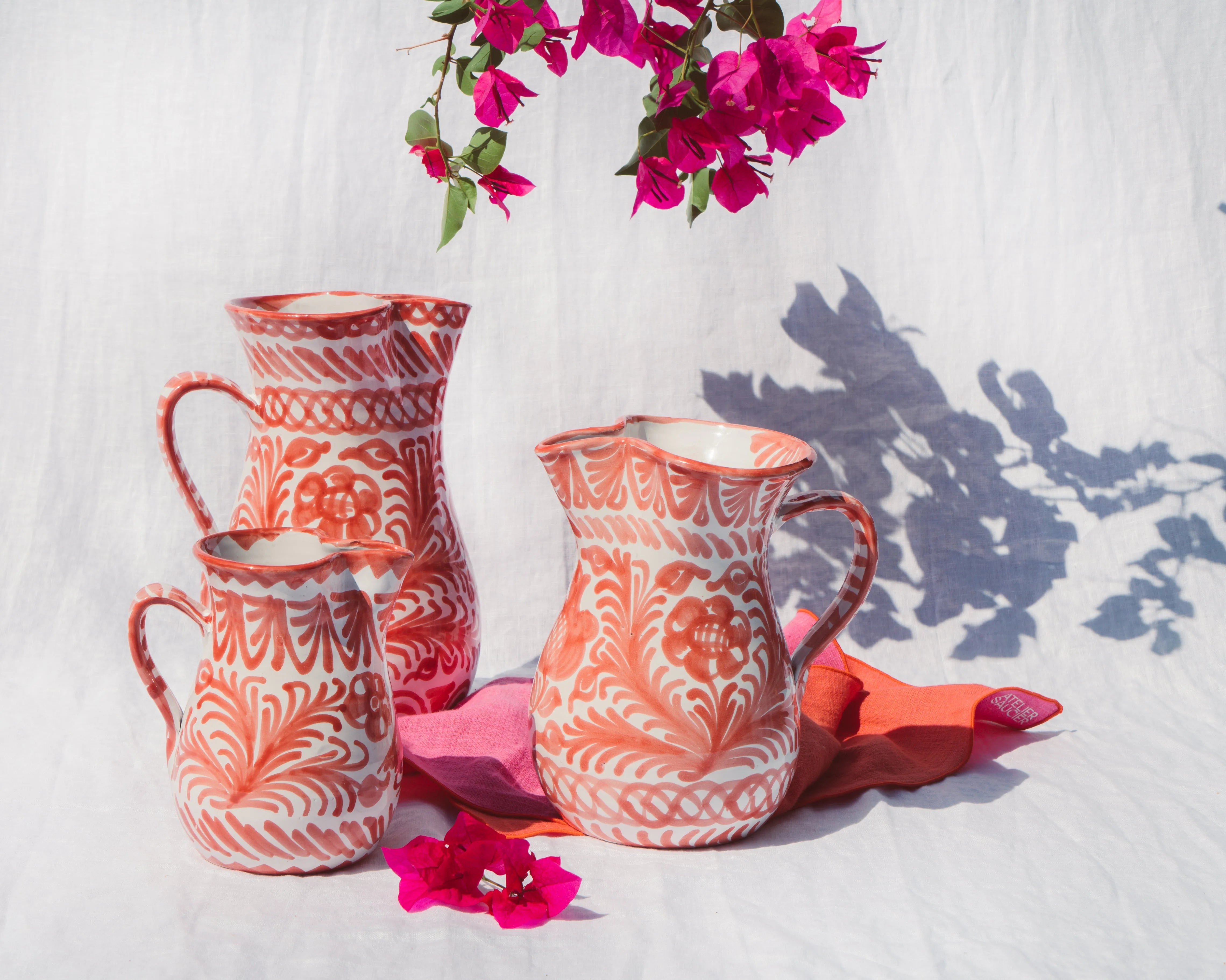 Medium pitcher with hand painted designs