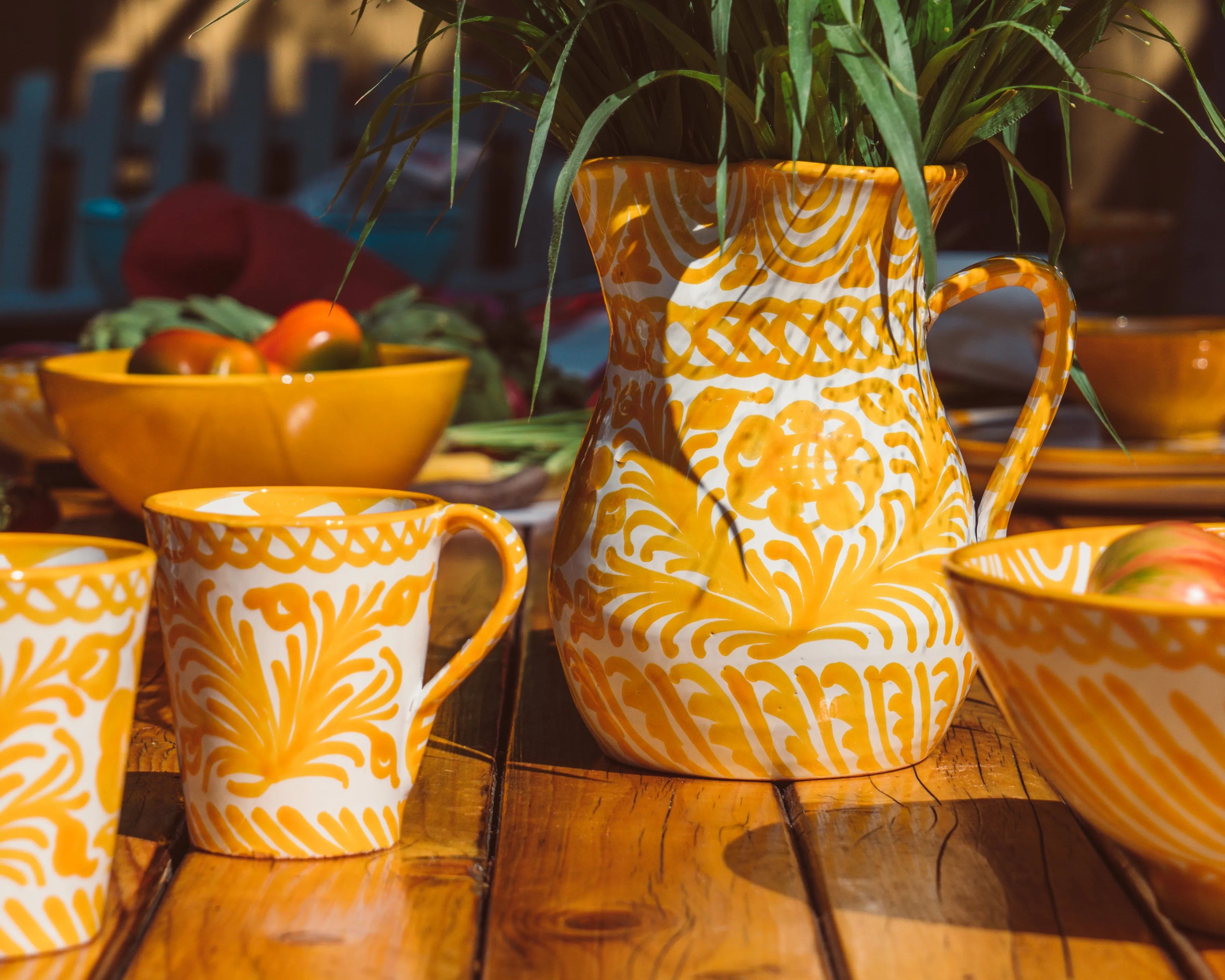 Medium pitcher with hand painted designs