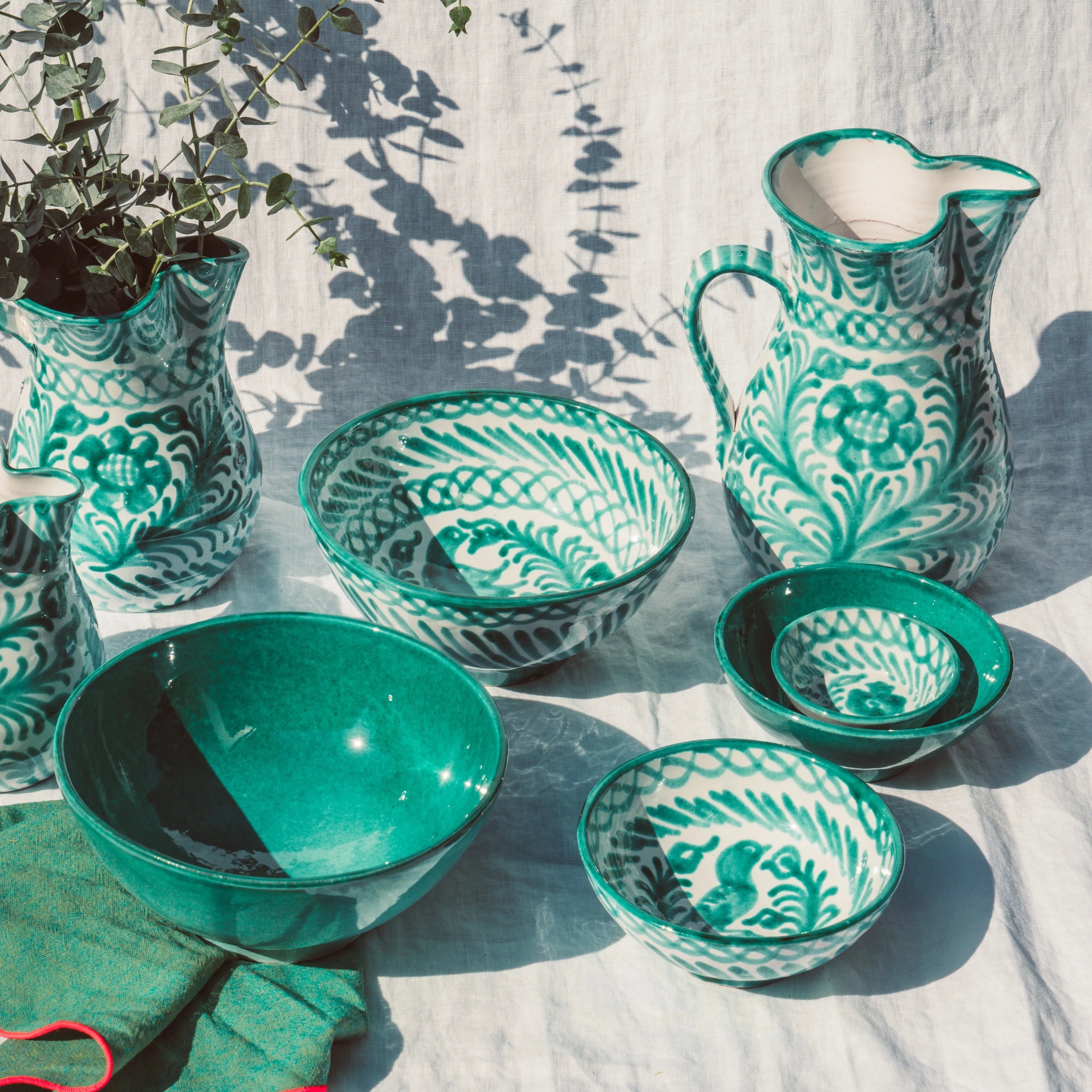 Large pitcher with hand painted designs