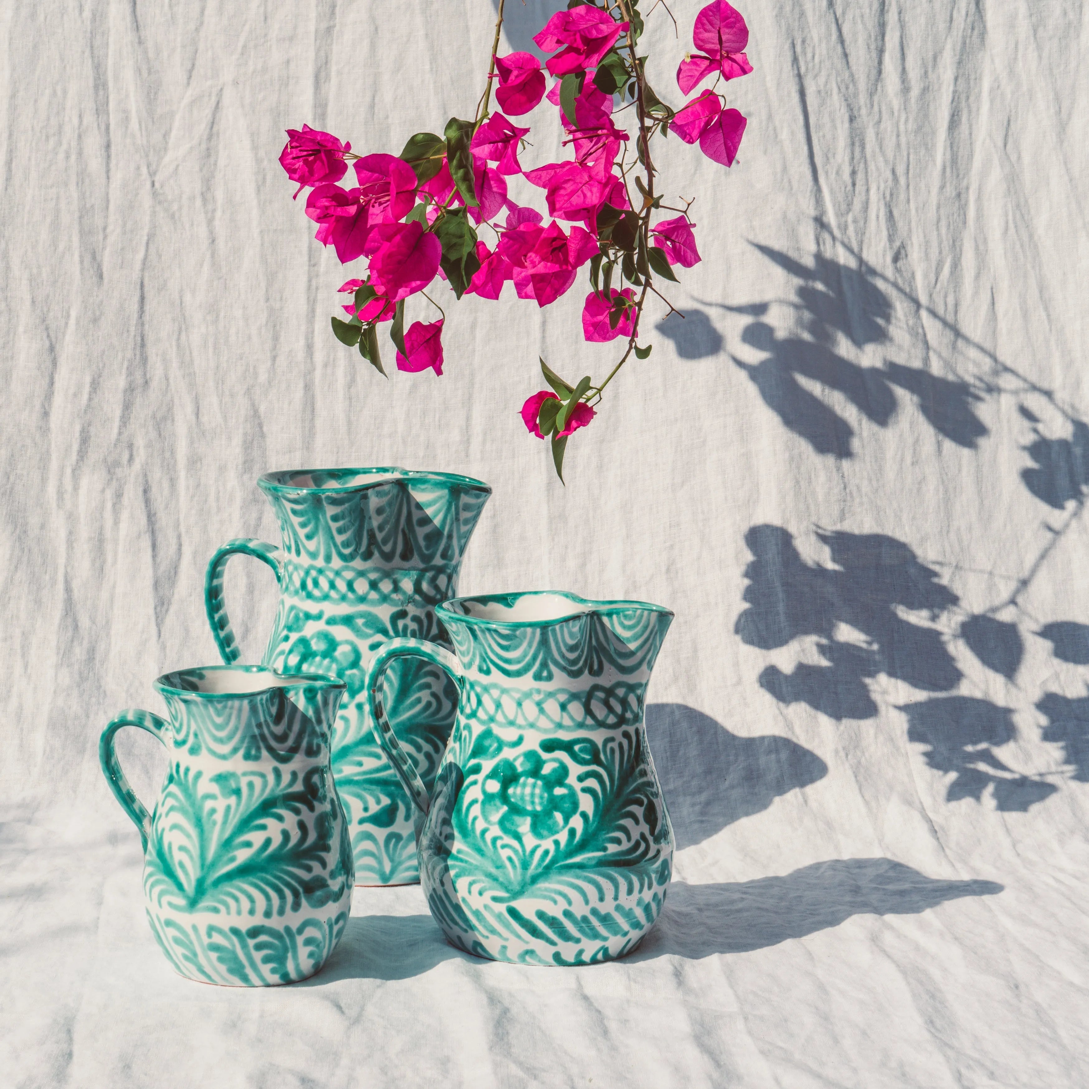 Small pitcher with hand painted designs