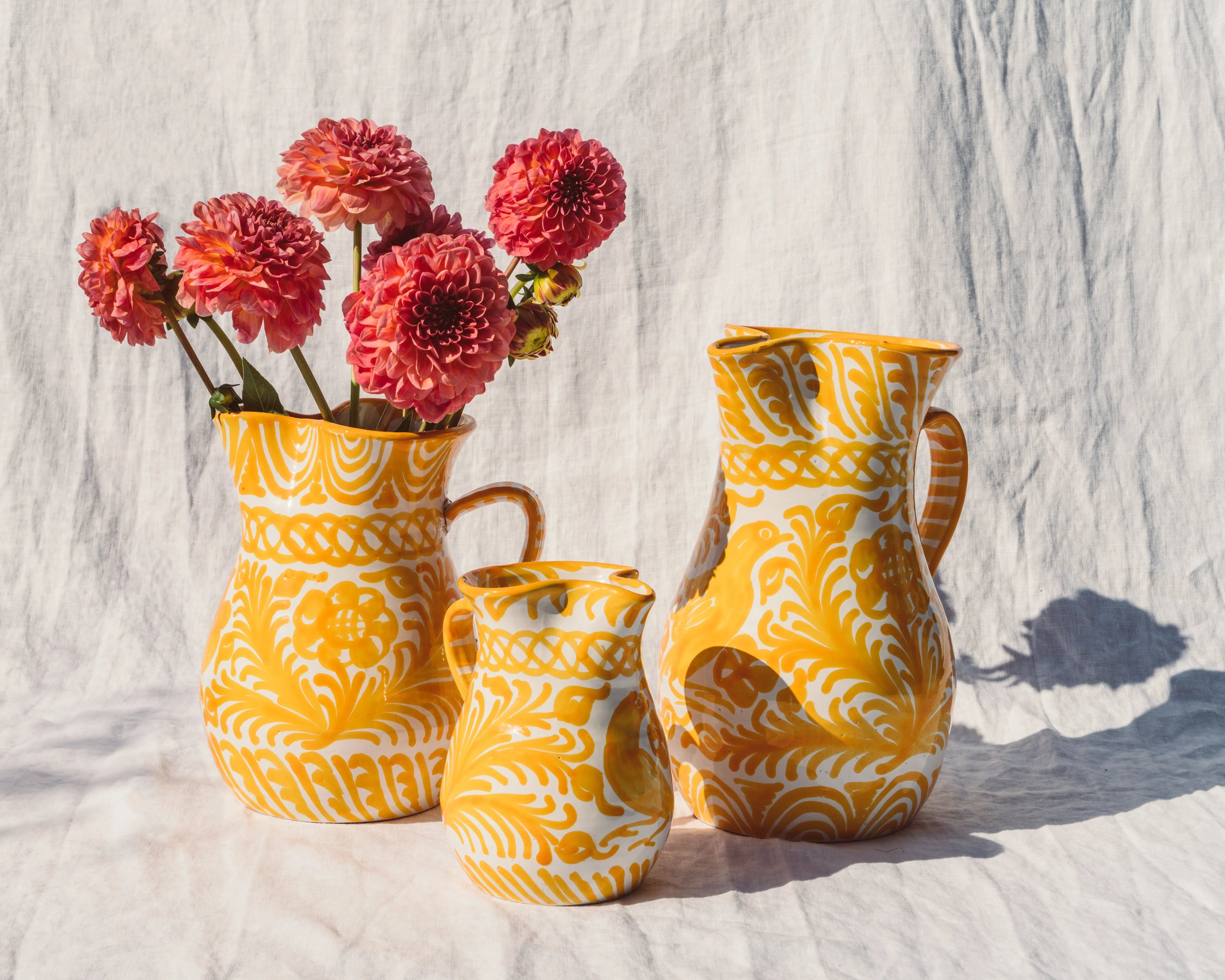 Small pitcher with hand painted designs