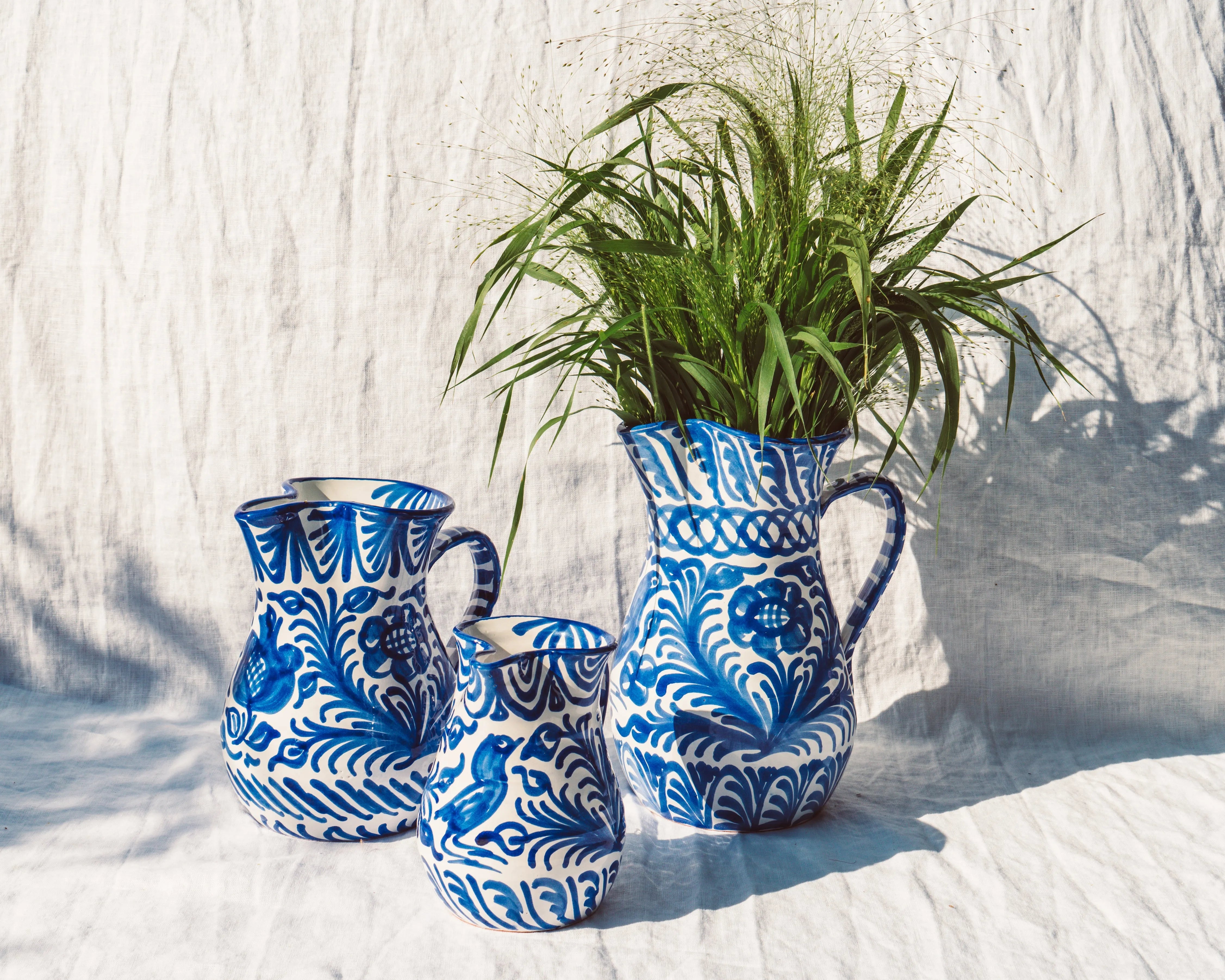 Small pitcher with hand painted designs