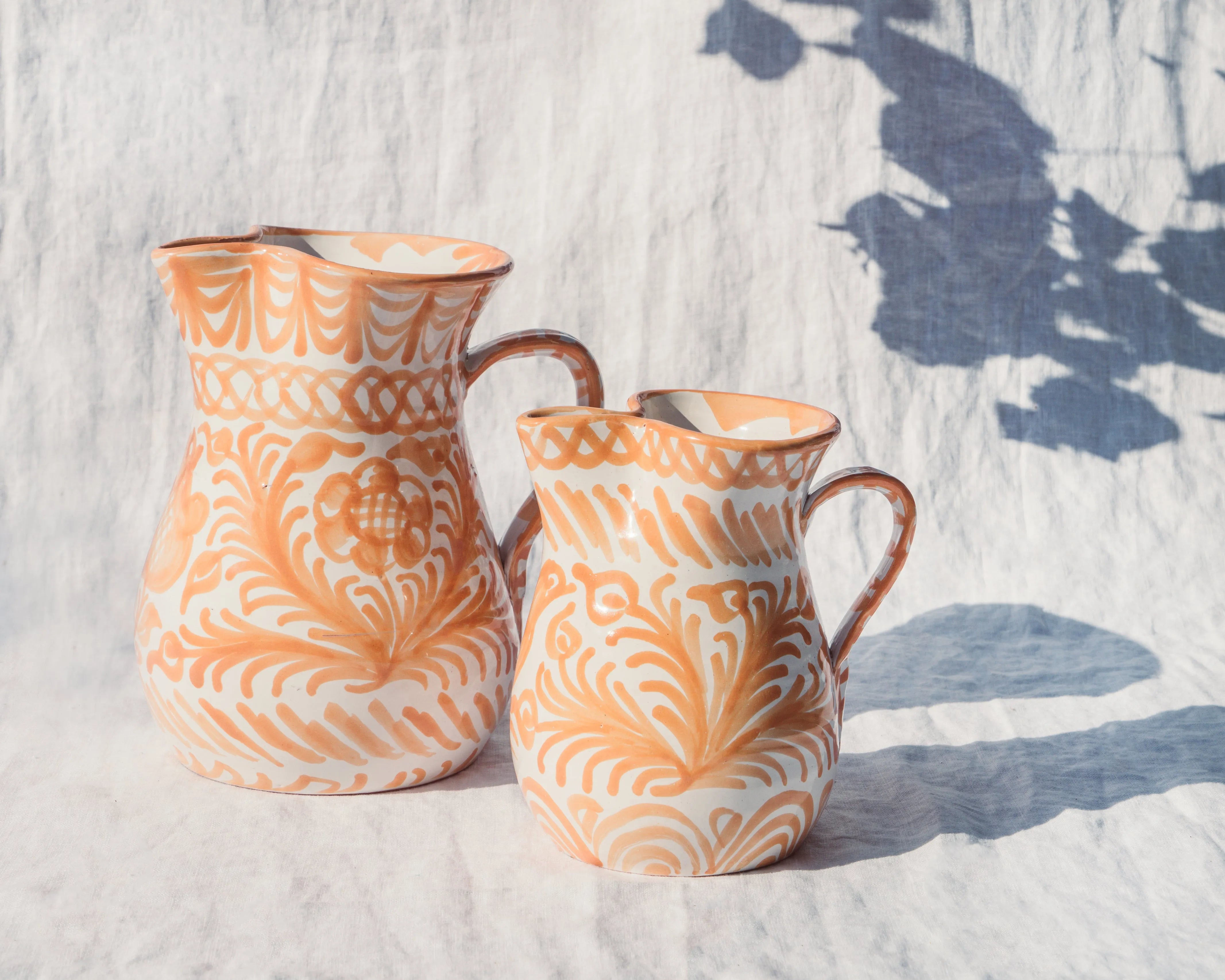 Small pitcher with hand painted designs