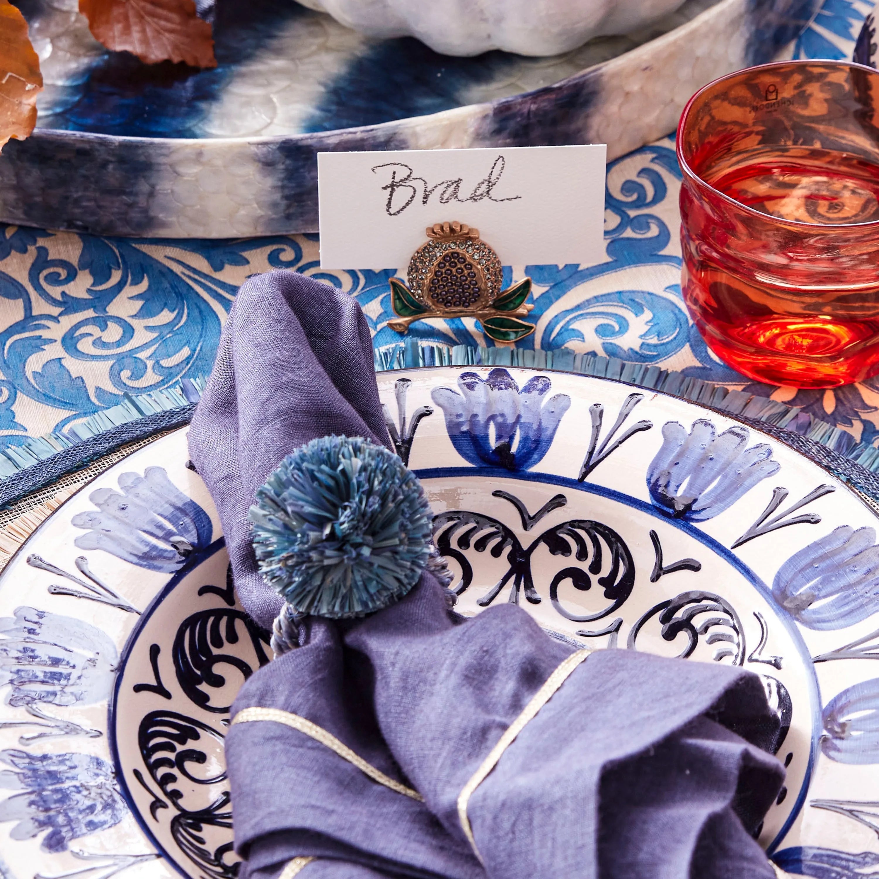 Straw pompom napkin rings, indigo, set of four