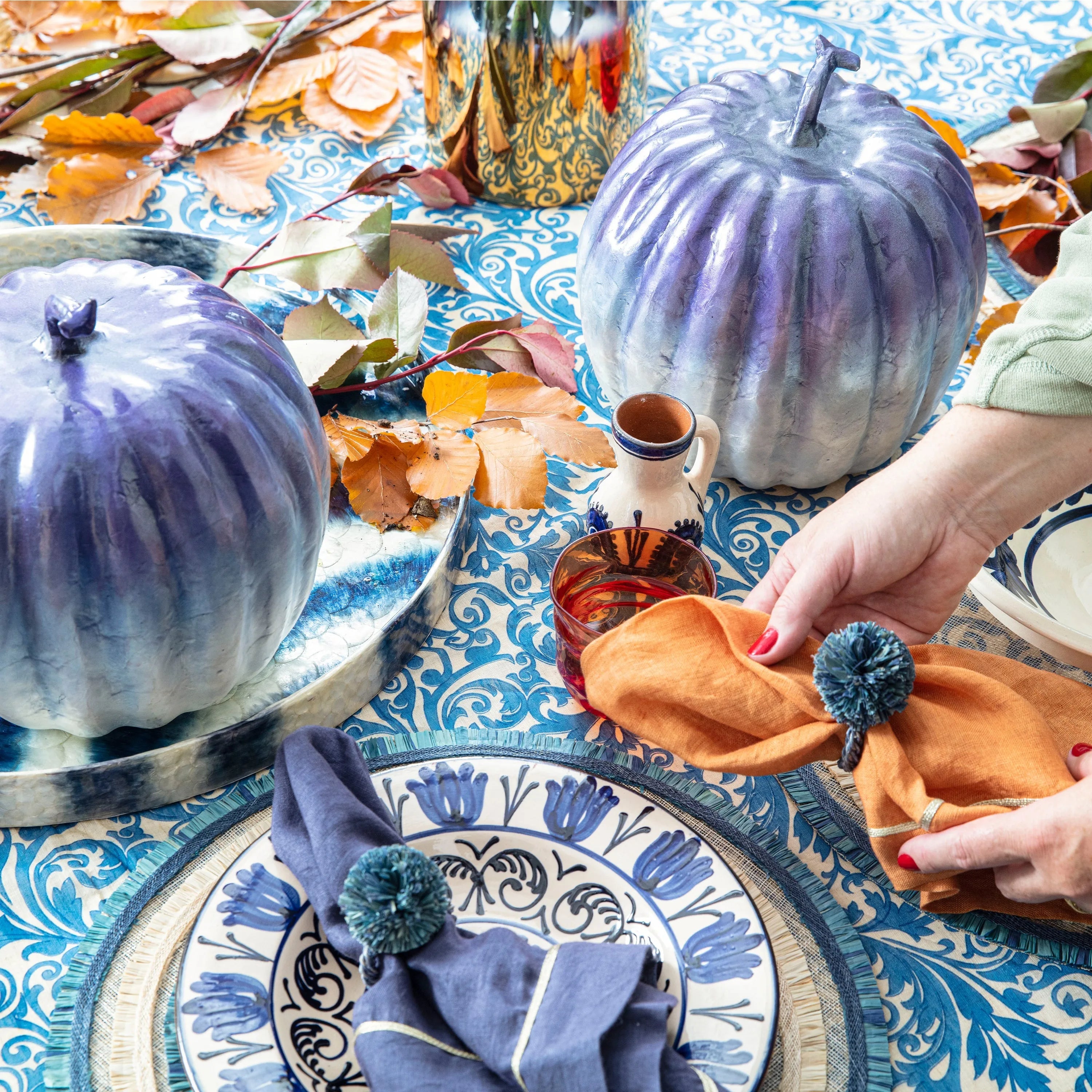 Straw pompom napkin rings, indigo, set of four