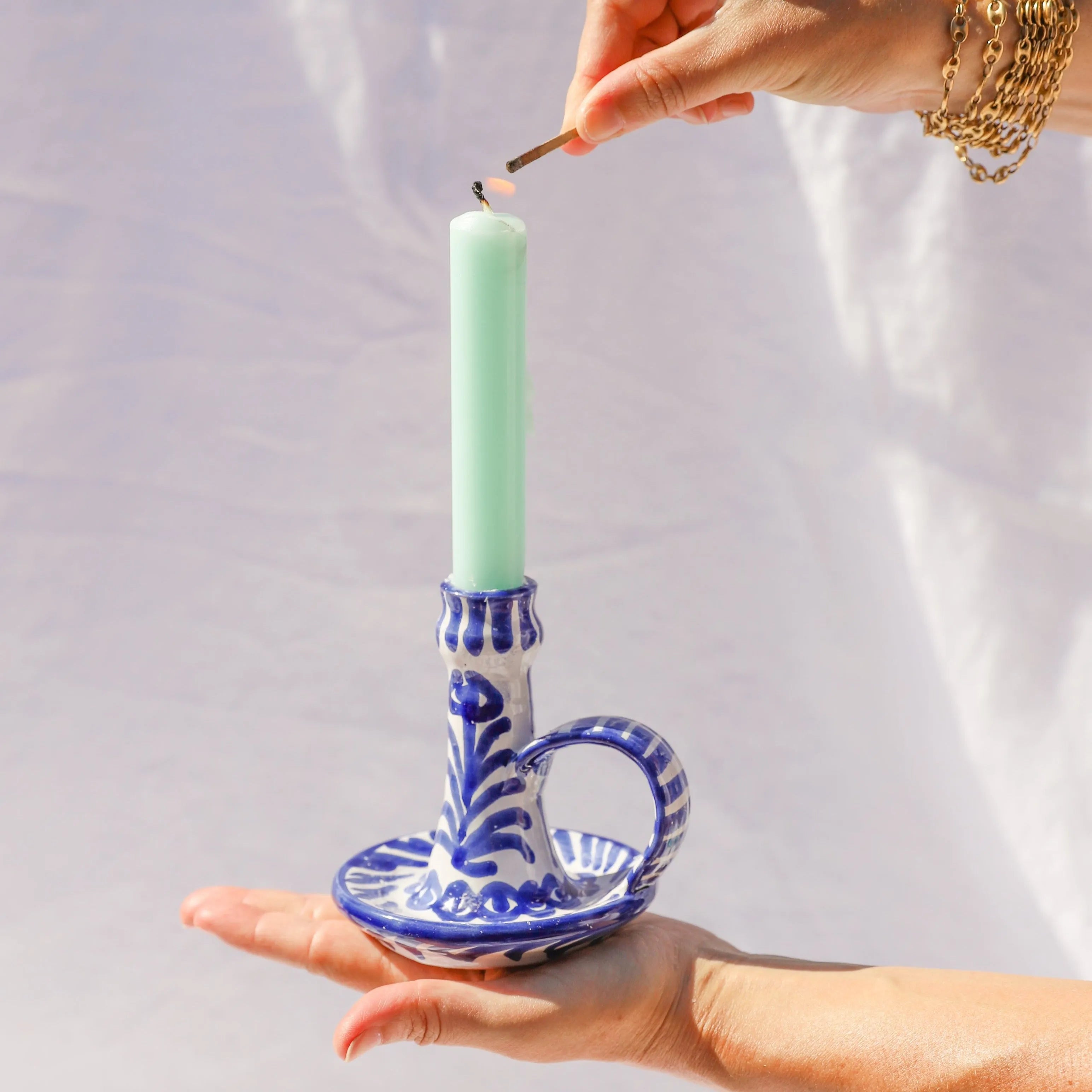 Candlestick with hand painted designs