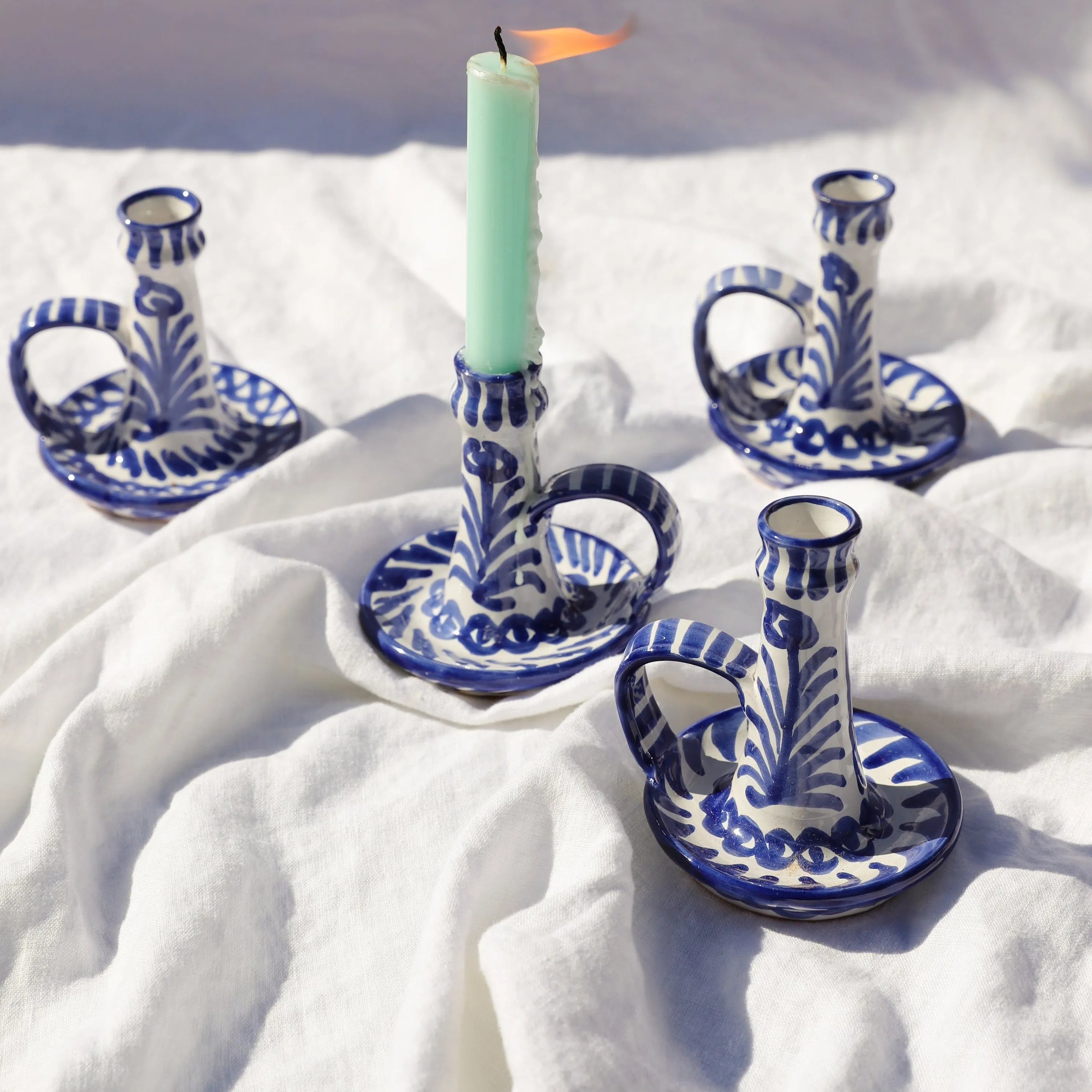 Candlestick with hand painted designs