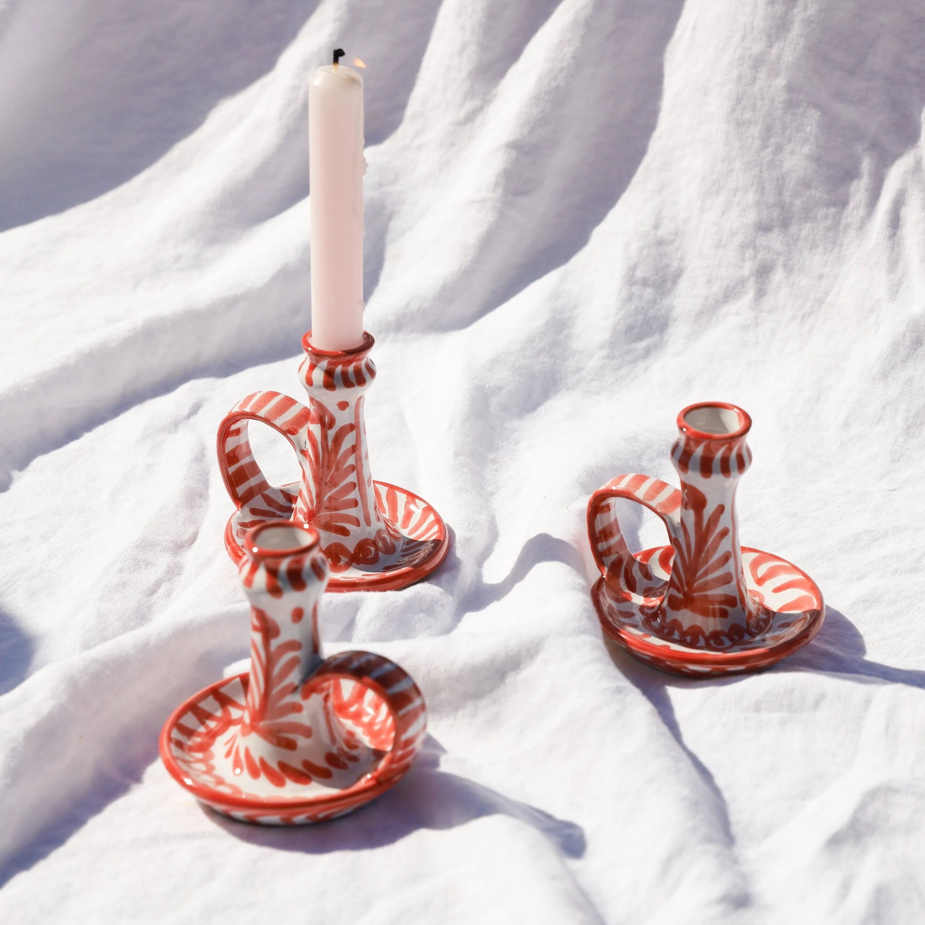 Candlestick with hand painted designs