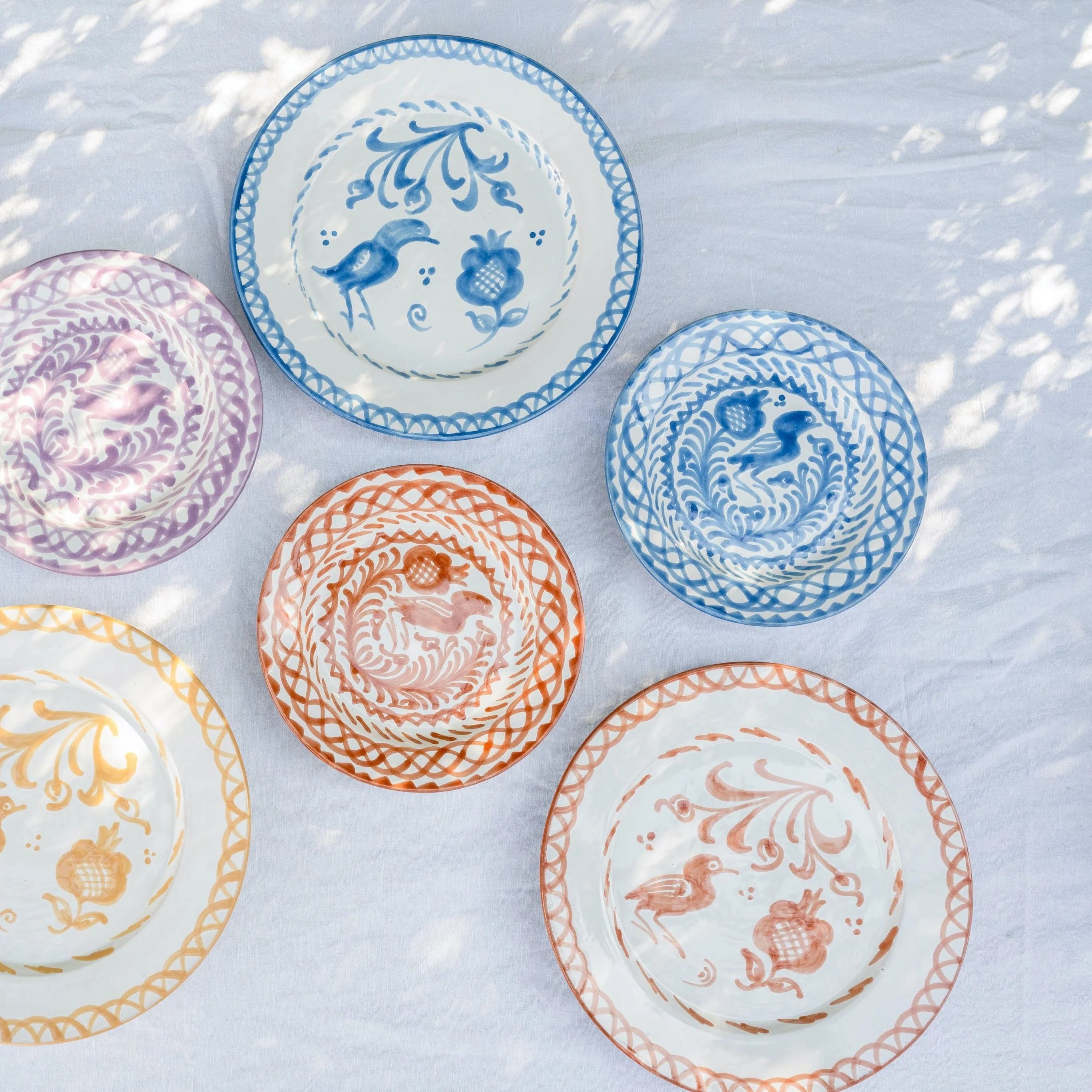 Dinner plate with hand painted designs