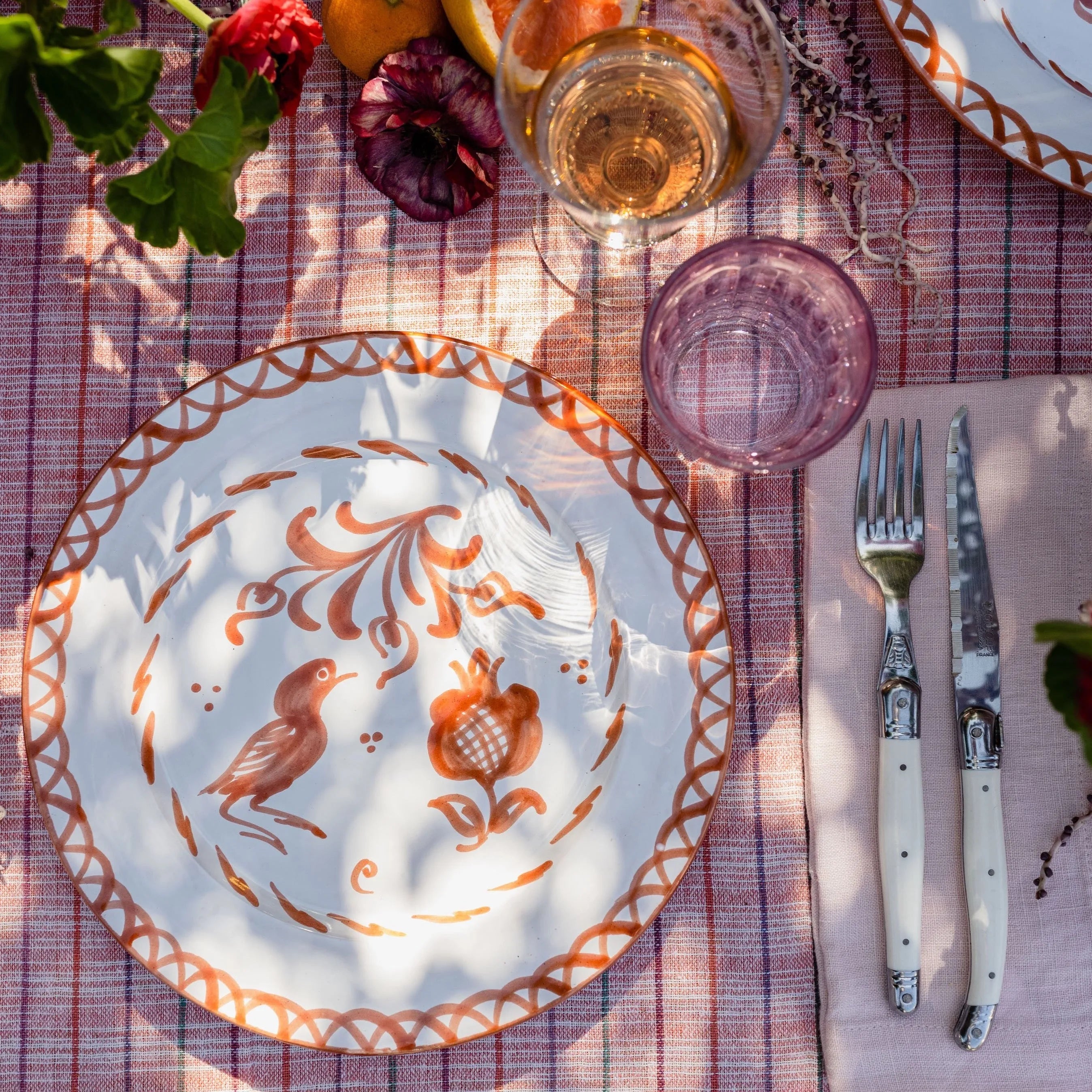 Dinner plate with hand painted designs