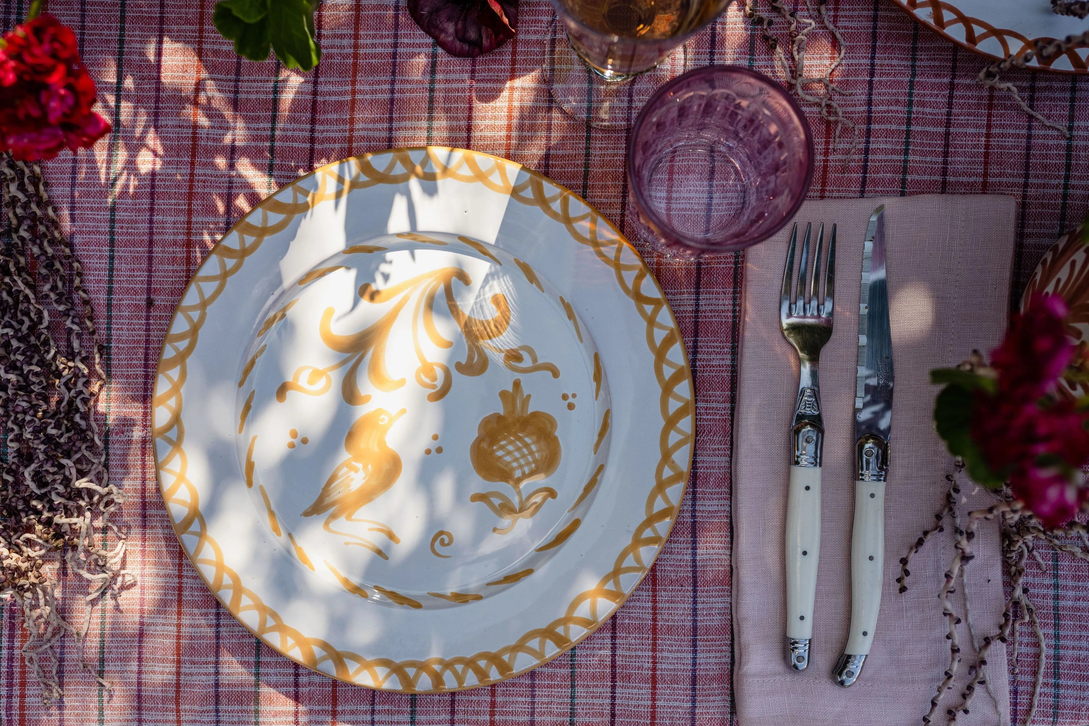 Dinner plate with hand painted designs