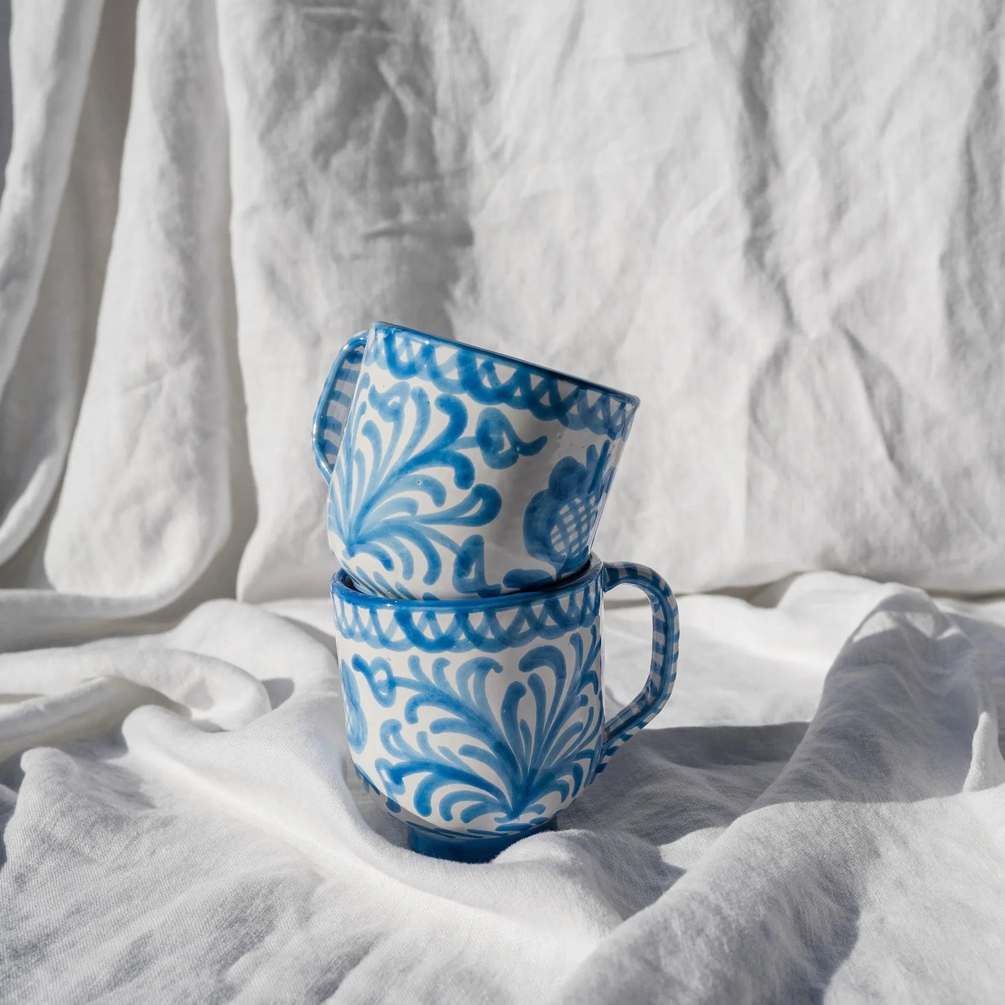 Mug with hand painted designs