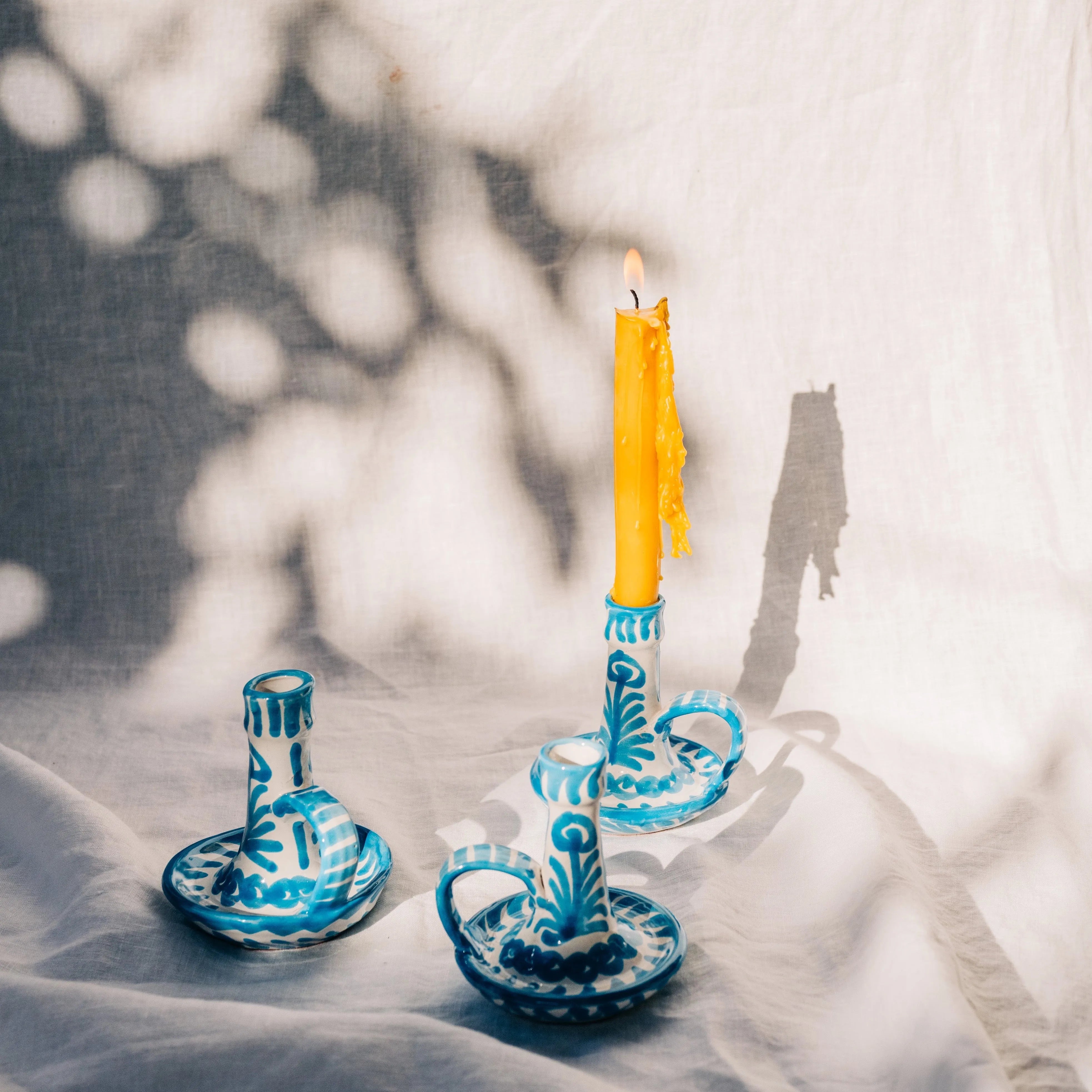 Candlestick with hand painted designs