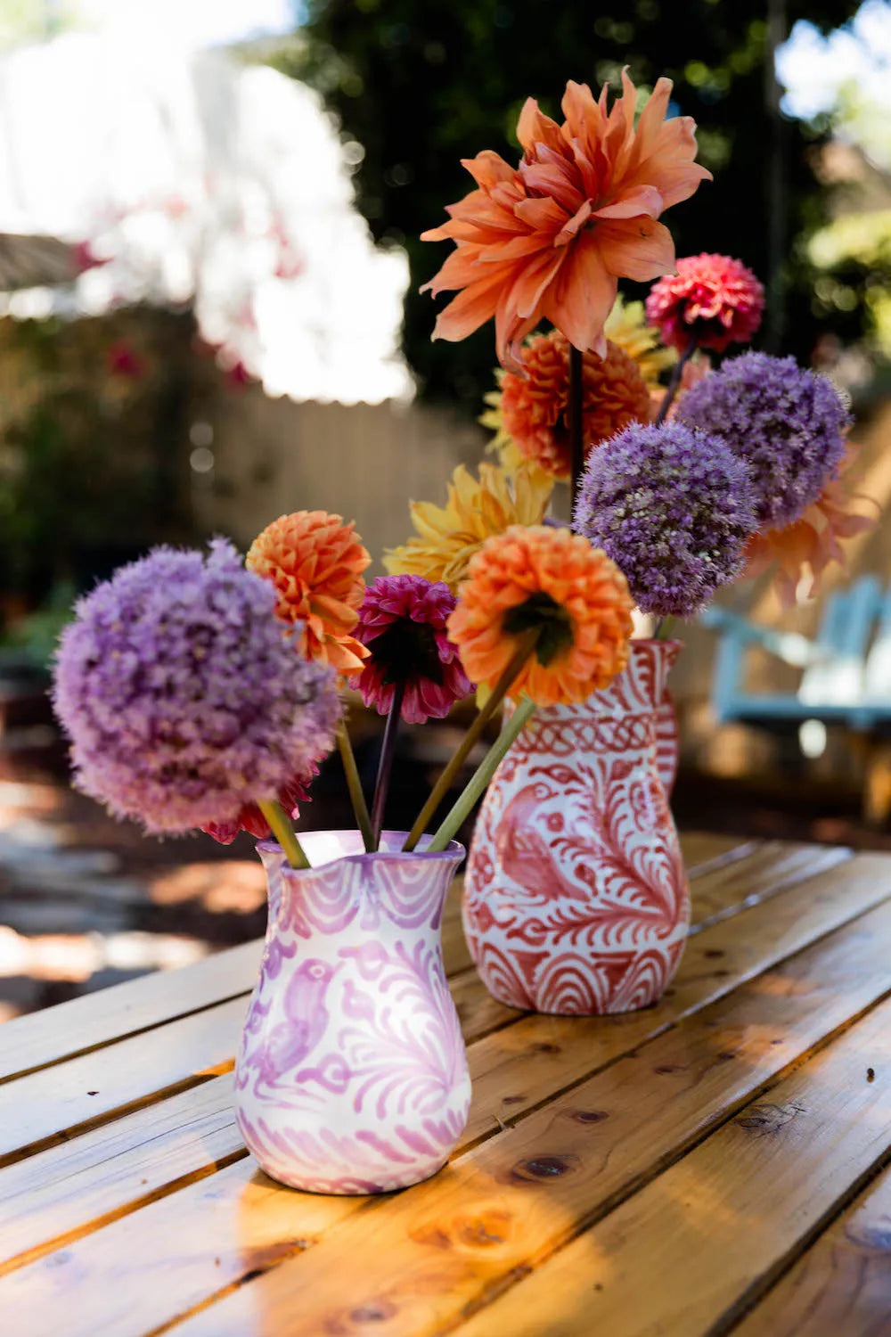 Medium pitcher with hand painted designs