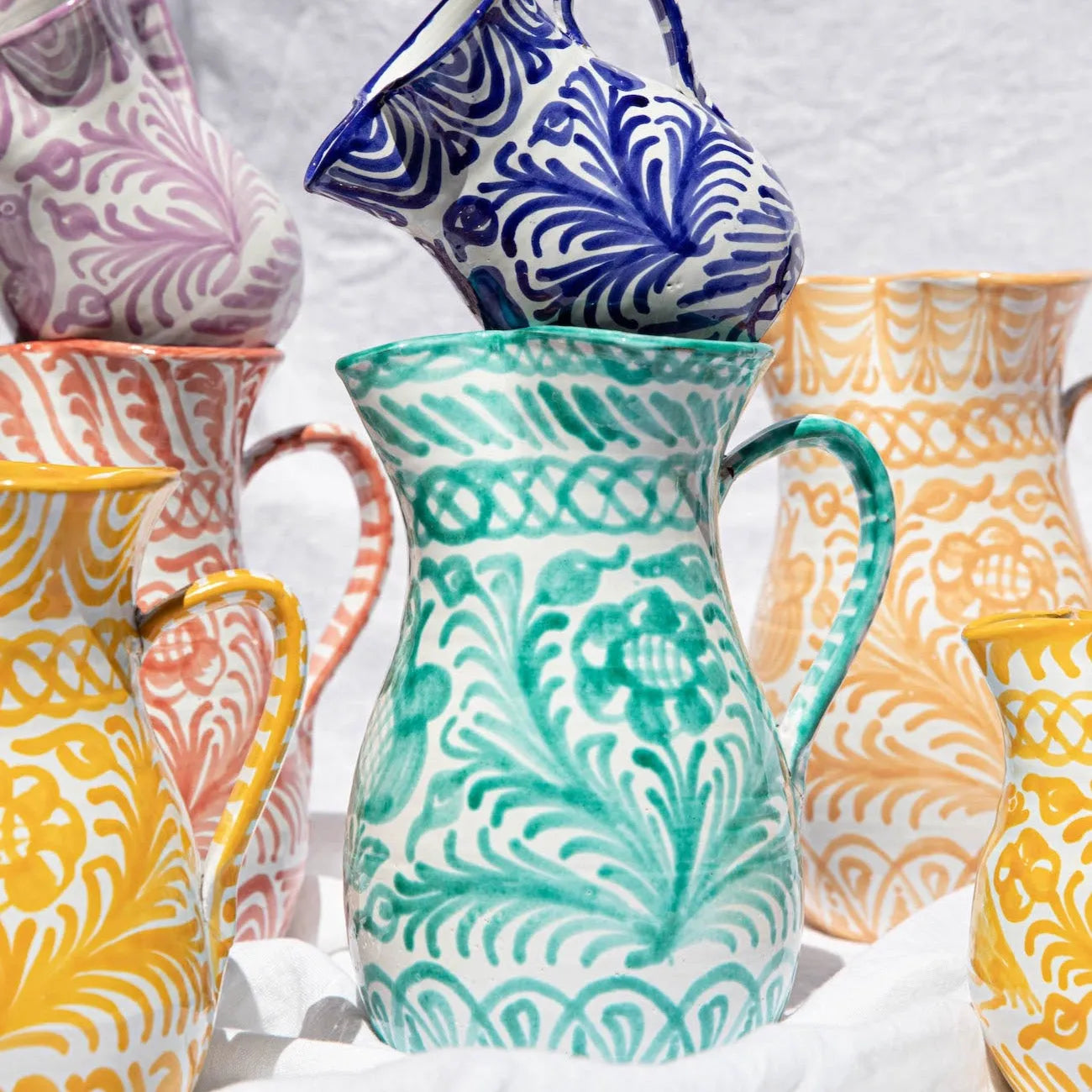 Large pitcher with hand painted designs