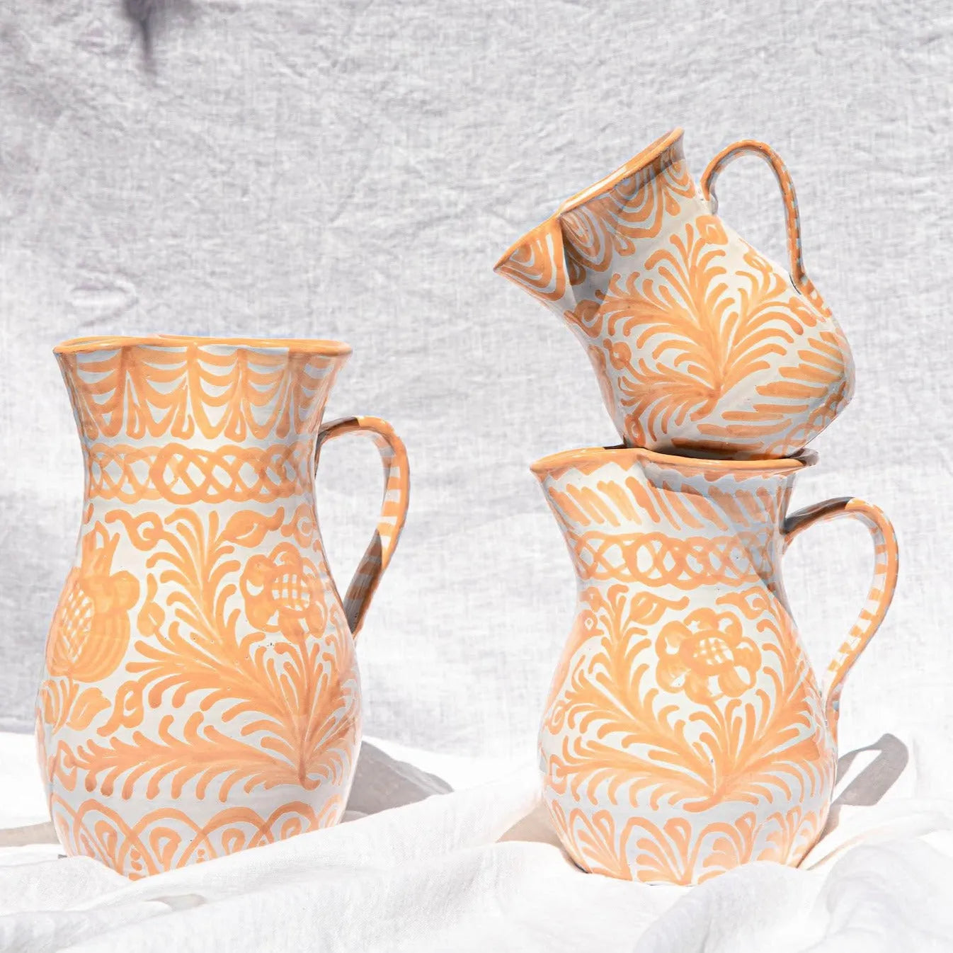 Small pitcher with hand painted designs