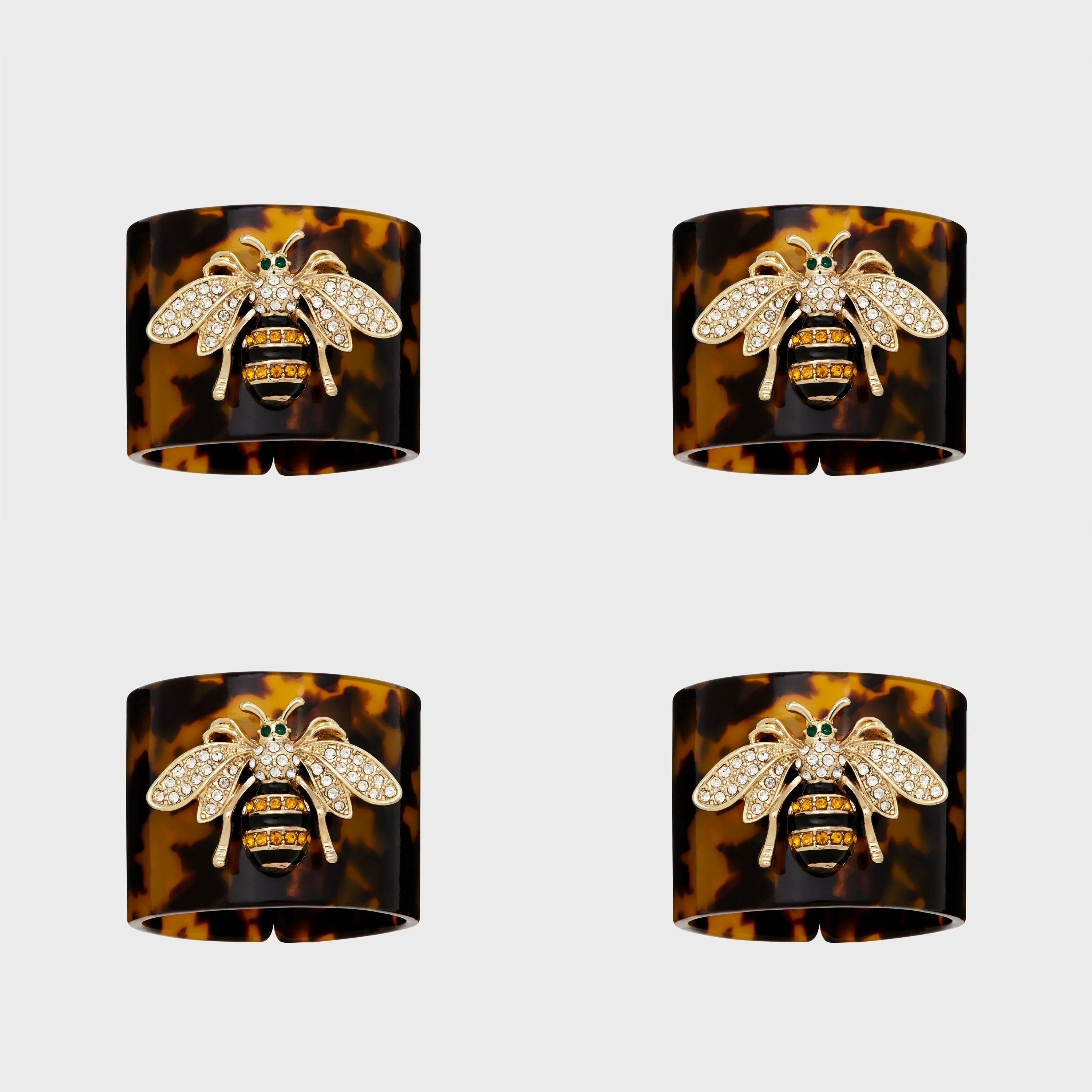 Stripey bee resin napkin rings, tortoiseshell, set of four