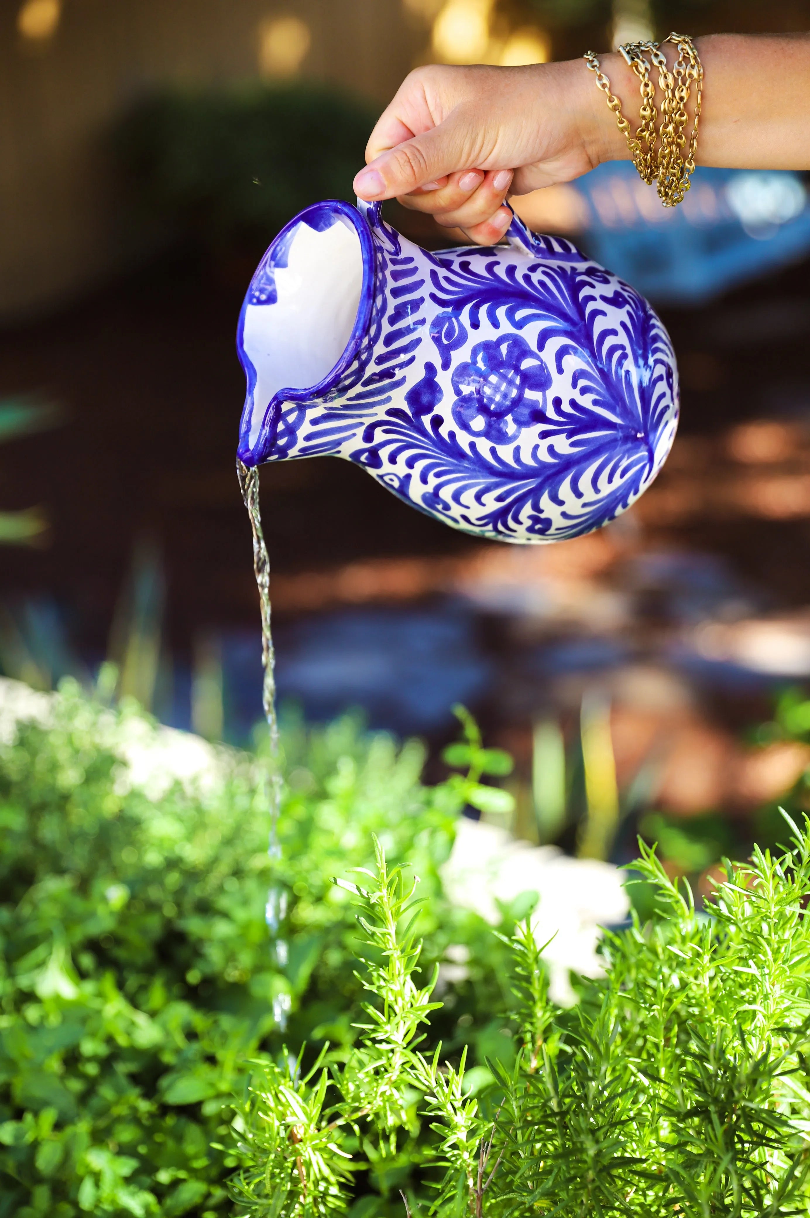 Medium pitcher with hand painted designs