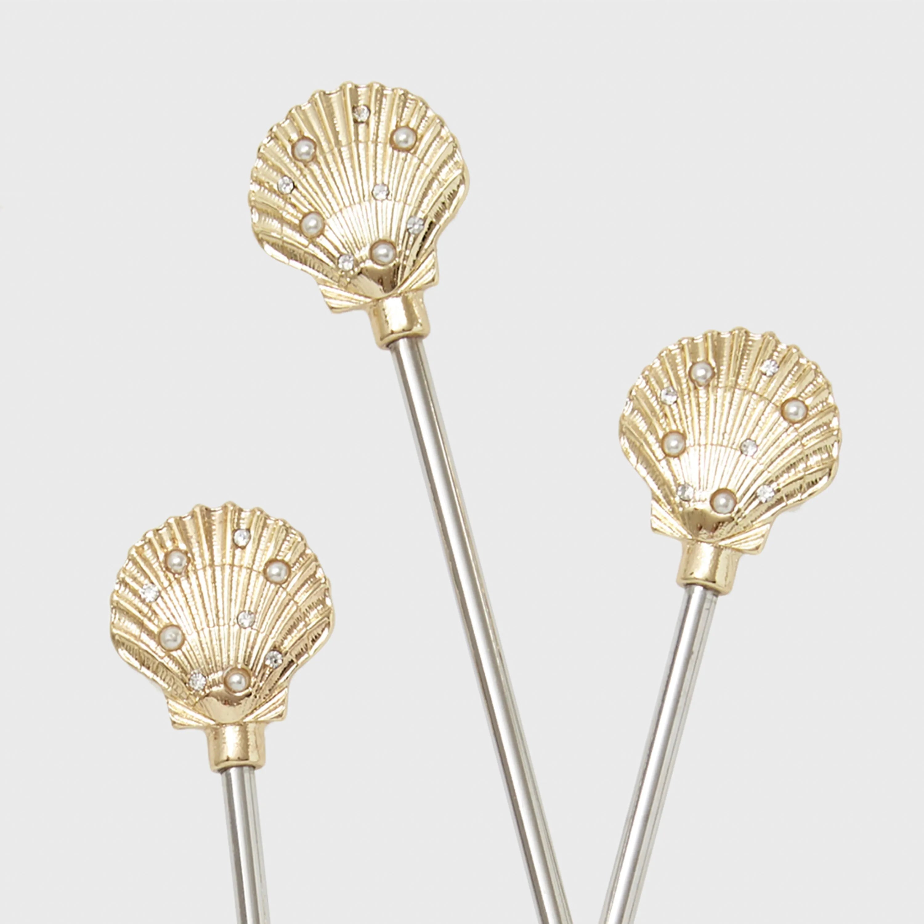 Shell swizzle sticks