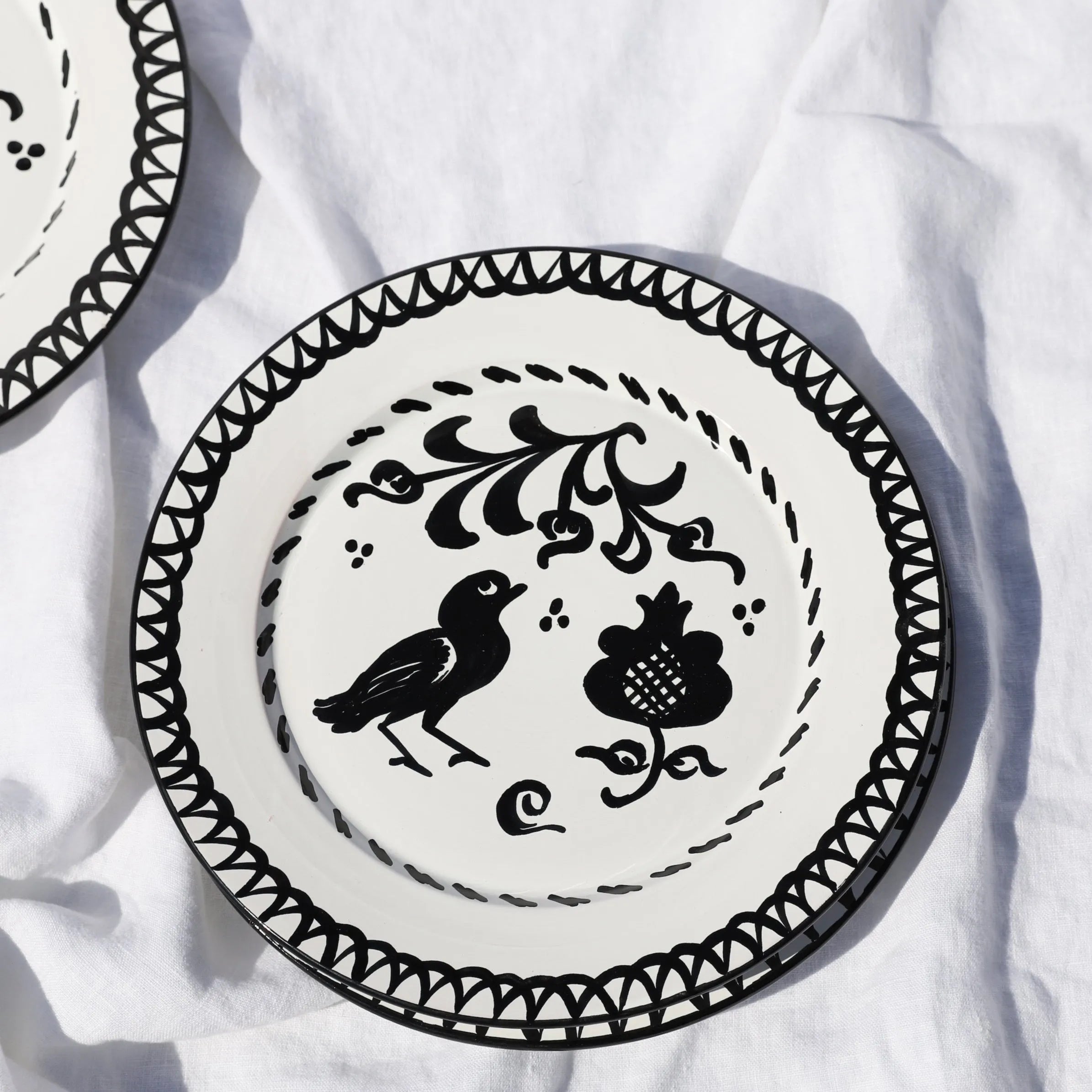 Dinner plate with hand painted designs