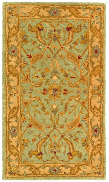 Antiquity Wool Rug in Teal and Beige