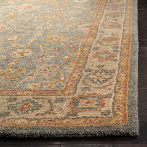 Antiquity Wool Rug in Blue and Ivory