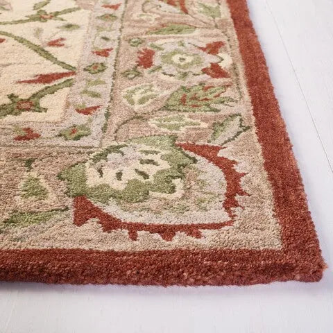 Antiquity Wool Rug in Rust and Ivory