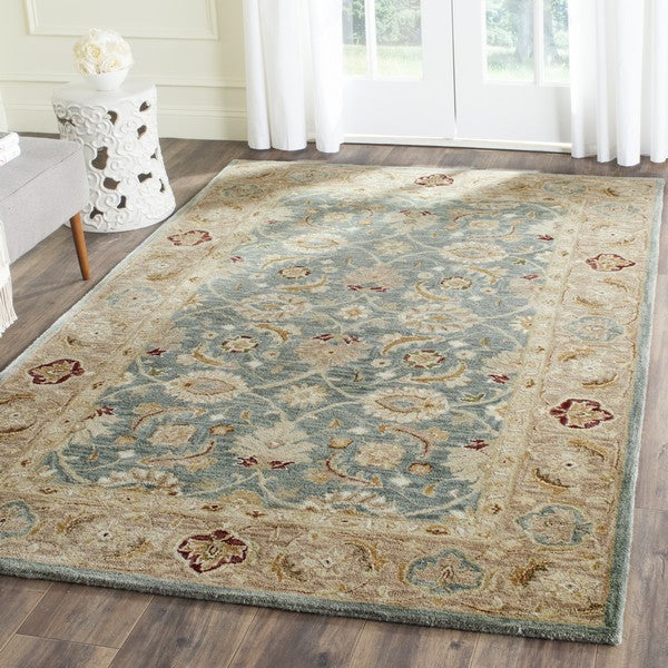 Antiquity Wool Rug in Teal Blue and Taupe